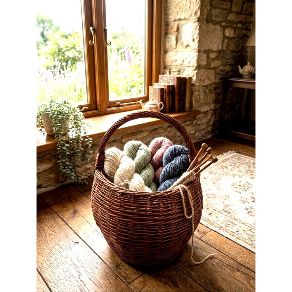 Hand-woven brown wicker gathering basket with a single arched handle vintage